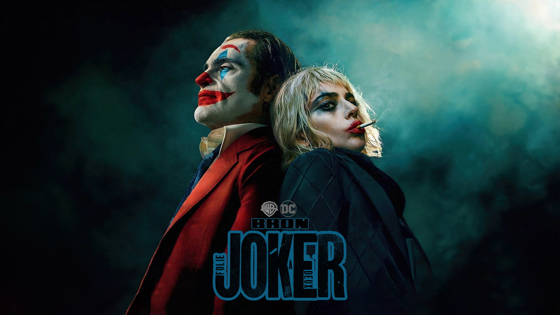 Póster de “Joker: Folie à Deux” (2024) con el Joker (Joaquin Phoenix) con maquillaje característico de payaso y fondo oscuro urbano, mostrando el título en letras grandes.